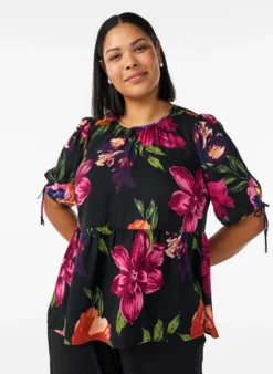 Bluse mit geblümtem Print und Peplum