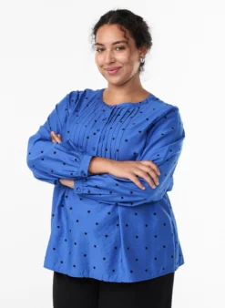 Gepunktete Bluse mit langen Ärmeln
