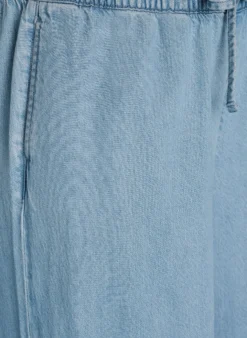 Joggers aus Denim mit weitem Bein und hoher Taille