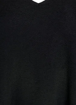Kurzes, gemustertes Kleid mit Rüschen am Saum