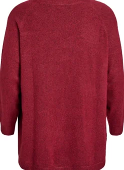 Lange Strickbluse mit Kugelknöpfen
