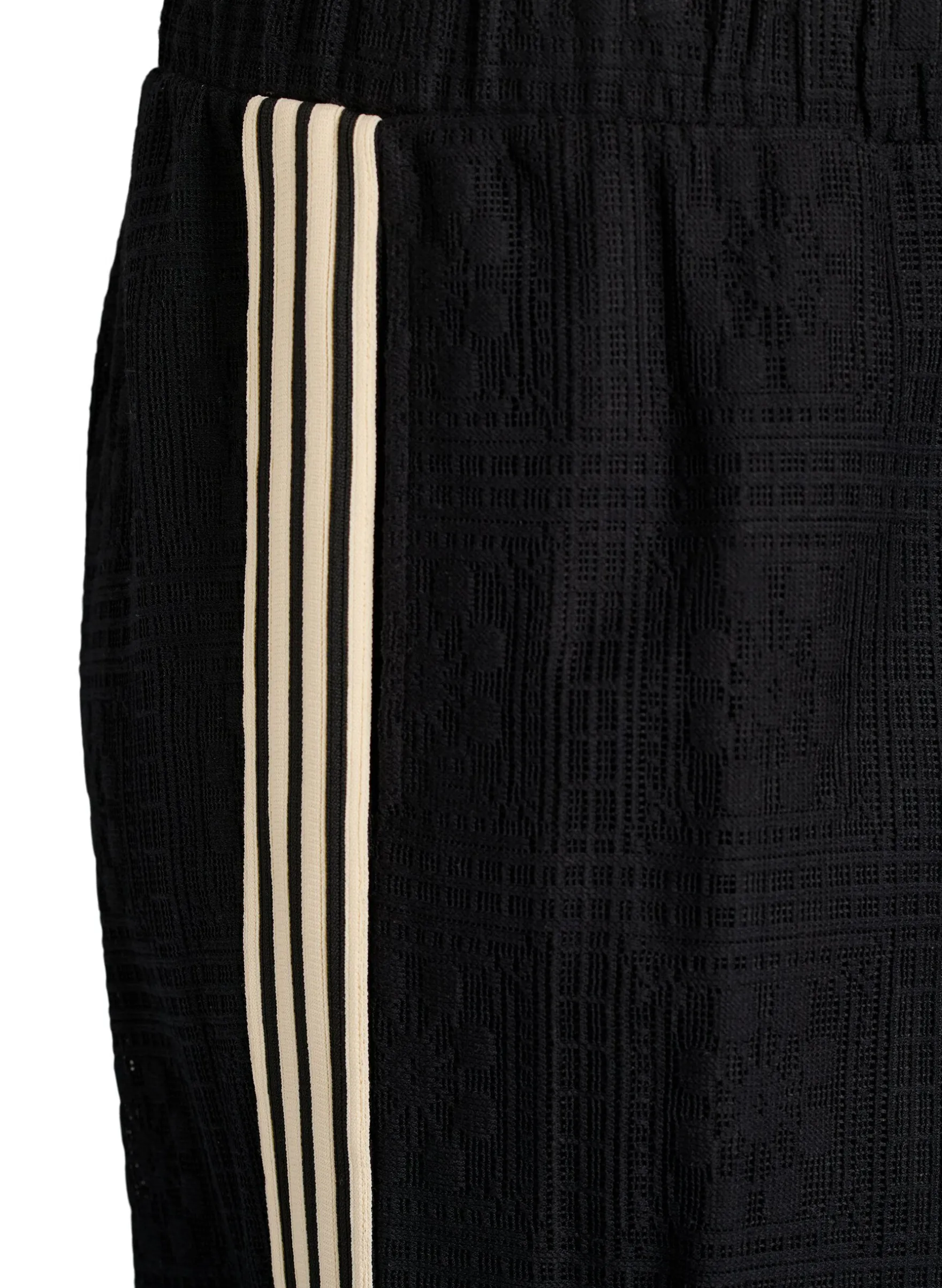 Weite Spitzenhose mit Kontraststreifen